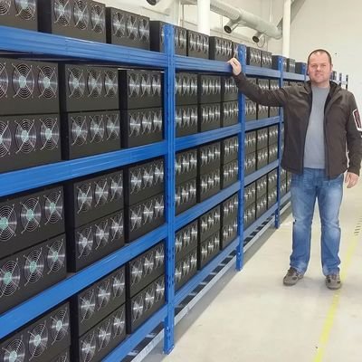 A bustling mining farm showcasing rows of mining rigs